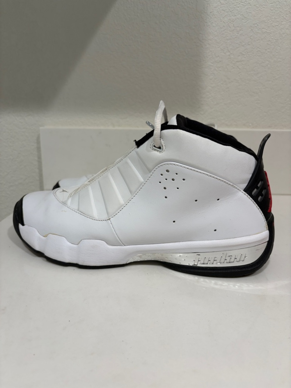 Jordan White and Black Basketball Sneakers - Picture 3 of 11